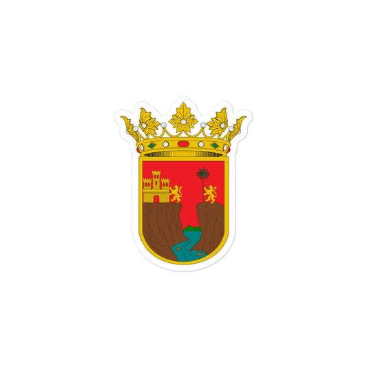 A sticker with the official coat of arms of Chiapas, featuring a crown, red and yellow elements, and a depiction of a face and a turtle.