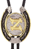 Western bolo tie with black braided cord and engraved oval pendant, gold letter Z center