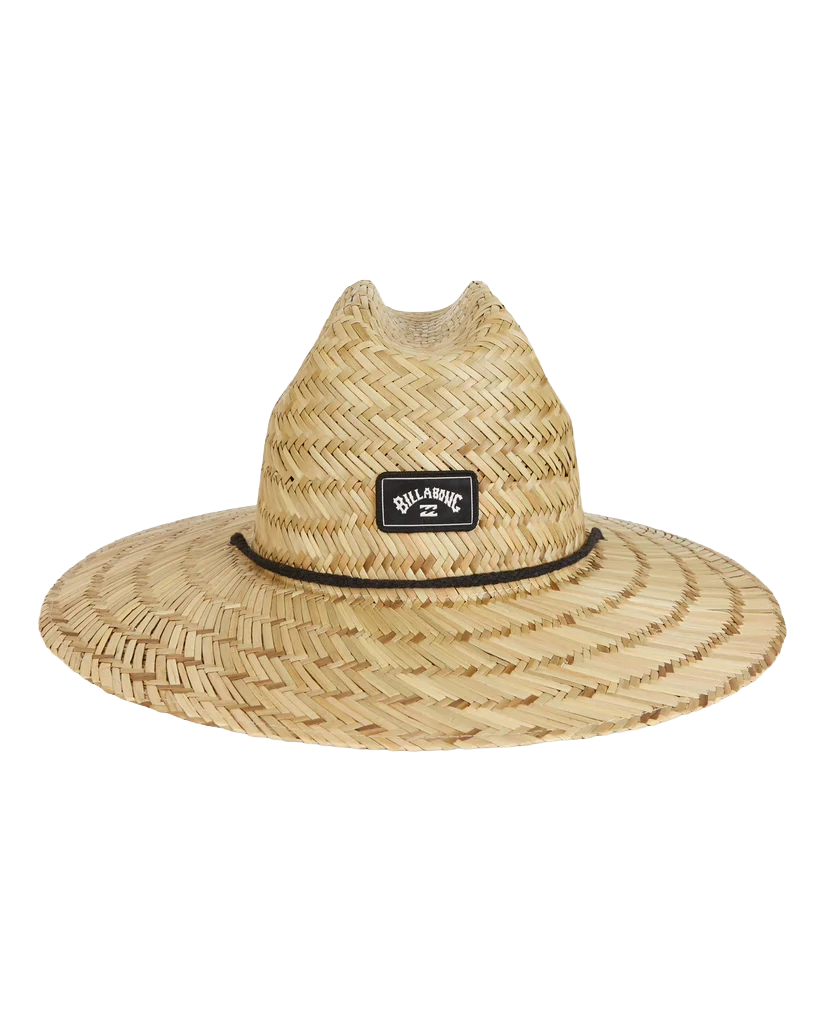 A natural straw fedora hat with a wide brim, featuring a black band and a central black brand patch that reads 'BILLABONG'.