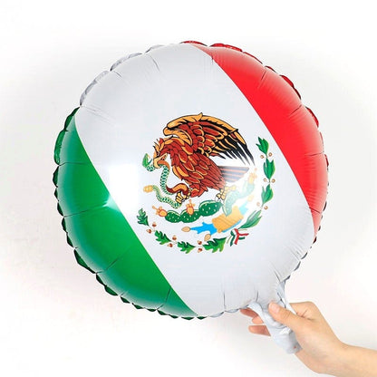 A round foil balloon with a design resembling the Mexican flag, predominantly green, white, and red, with a emblem in the center.