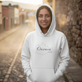 A white hoodie with 'Oaxaca' text on the front and a hood.