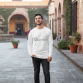 A person wearing a white long sleeve t-shirt with 'Queretaro' written on it in black script.