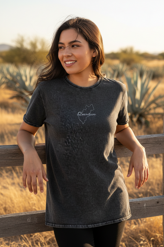 A woman wearing a black denim t-shirt with the text 'Queretaro' written on the front.