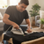 Mexico flag patch being ironed onto a black shirt