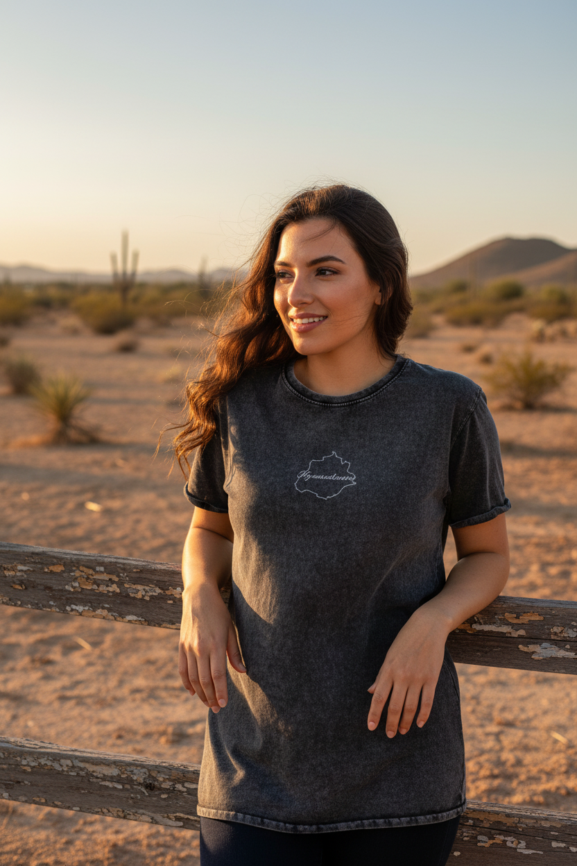 A woman wearing a short-sleeved black denim t-shirt with a round neck.