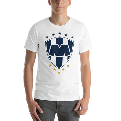 A person wearing a Monterrey white crew neck t-shirt with a graphic logo in the center, which includes the letters 'C.F.