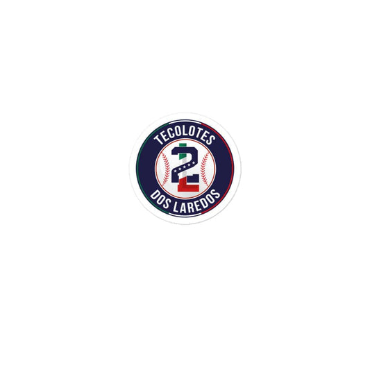 A round sticker with the 'Tecolotes Dos Laredos' logo, predominantly white with red and green elements, and text.