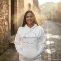 A person wearing a white pullover hoodie with 'Aguascalientes' text on the front.