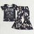 Baby girls singer outfit set with black speckle graphic tee and matching flared pants