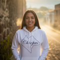 A person wearing a white unisex hoodie with the text 'Chiapas' written in a stylized font.