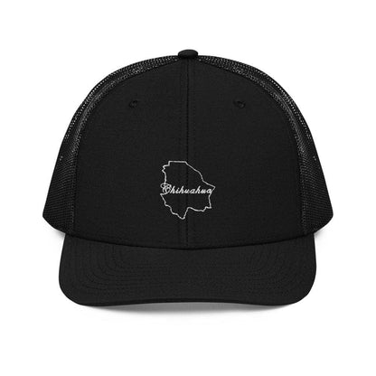 A black snapback trucker cap with a structured design, featuring a white embroidered chihuahua graphic at the front and a mesh back.