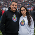 A white hoodie with the Club deportivo Guadalajara Chivas logo on the front.