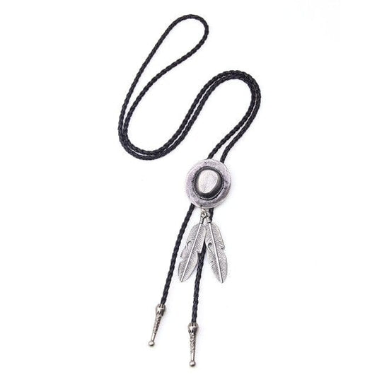 A Cowboy Bolo Tie featuring a synthetic leather necktie with a geometric pattern, a decorative button, and tassel details.