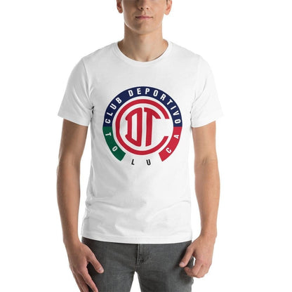 A man wearing a white short-sleeved t-shirt with a graphic logo of Club Deportivo Toluca FC.