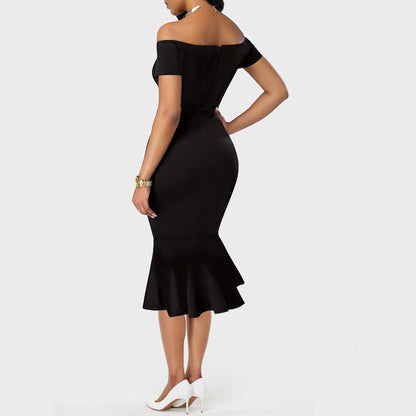 Black fitted mermaid hem sheath dress, short sleeves, back view