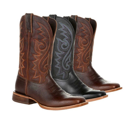Western cowboy boots in black and dark brown leather, ornate stitched patterns