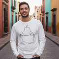 A person wearing a white long sleeve t-shirt with 'Mexico City' text in black on the front.