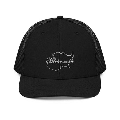 A black trucker cap with a pre-curved visor featuring a white embroidered text on the front.