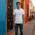 A person wearing a white short-sleeved t-shirt with the text 'Nuevo León' printed on the front.