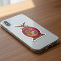 Clear phone case on a wooden surface featuring a die-cut bubble-free sticker of the official coat of arms of Sinaloa, Mexico. A red shield with gold border, white and gold eagle, and symbolic state emblems.