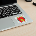 Official coat of arms of Tlaxcala die-cut sticker displayed on a silver laptop.