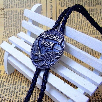 Bolo tie with oval eagle medallion, braided cord, and “American Pride” engraving