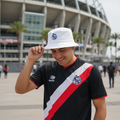 A white bucket hat with the Puebla F.C. logo embroidered on the front.