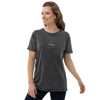 A woman wearing a black denim t-shirt with the text 'puebla' written on the front.