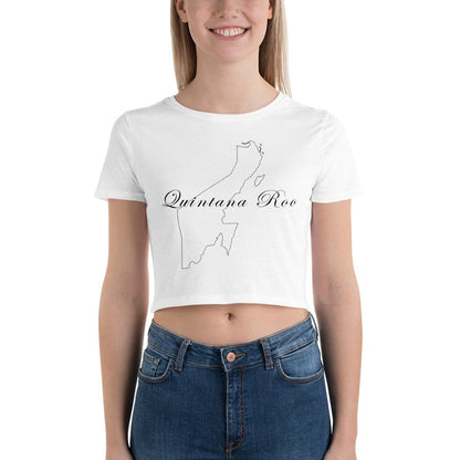 A woman wearing a white crop t-shirt with 'Quintana Roo' text in black, paired with blue jeans.