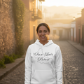 A person wearing a white hoodie with 'San Luis Potosi' written in black text on the front.