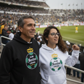 White and black hooded sweatshirt with 'Club Santos Laguna' logo on the front.