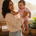 A short-sleeved pink T-shirt for babies with 'Tabasco' written in a stylized font resembling a map outline.