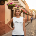 A person wearing a white sleeveless muscle tank top with the text 'Tabasco' printed on the front.