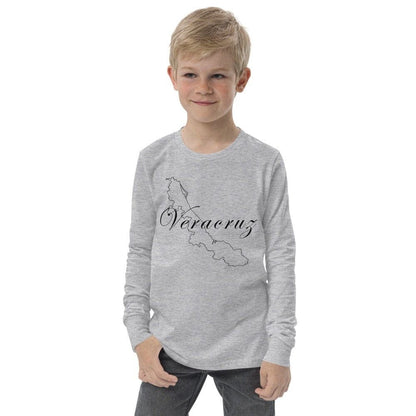A child wearing a long sleeve gray t-shirt with the text 'Veracruz' printed on the front.