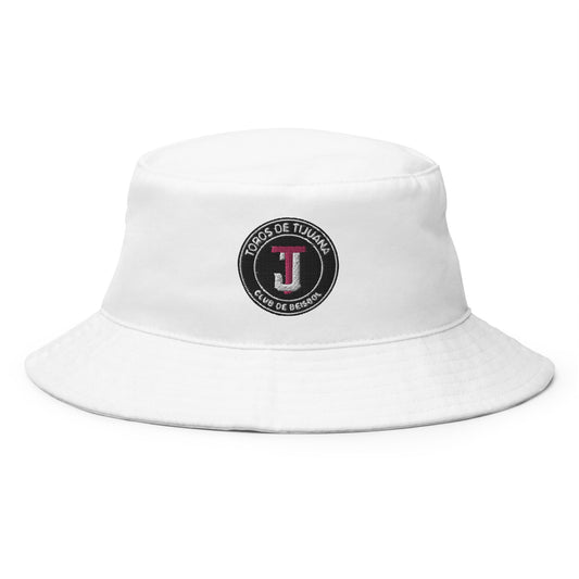A white cotton twill bucket hat with the 'Toros de Tijuana' logo on the front.