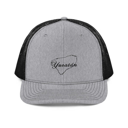 A gray Yucatan snapback trucker cap with a black visor featuring white embroidery of the Yucatan shape on the front.