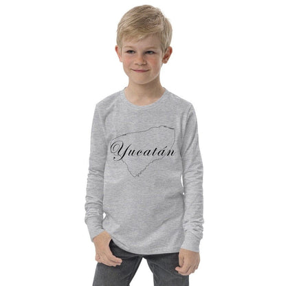 A child wearing a long sleeve white t-shirt with the text 'Yucatan' printed on the front.