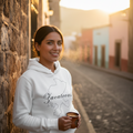 A man wearing a gray unisex sweatshirt with the text 'Zacatecas' printed on the front.