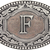 Western oval belt buckle with engraved two-tone F initial and scroll border