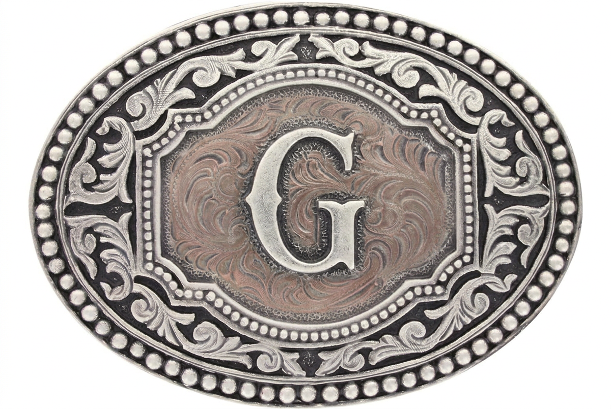 Western oval belt buckle with engraved two-tone G initial and scroll border