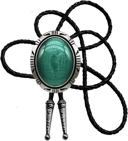 Celtic bolo tie with green oval stone, silver-toned frame, black braided cords.