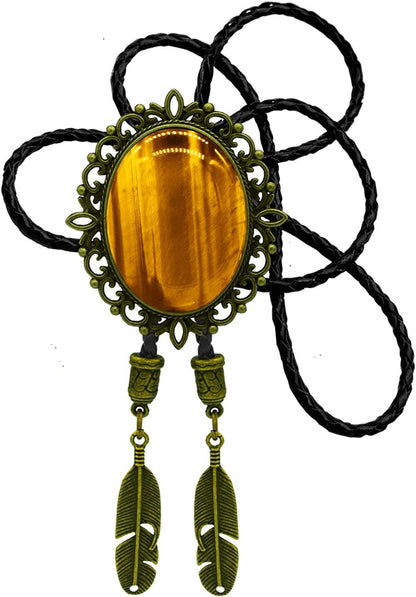 Natural stone bolo tie with amber-gold oval cabochon in ornate green metal setting